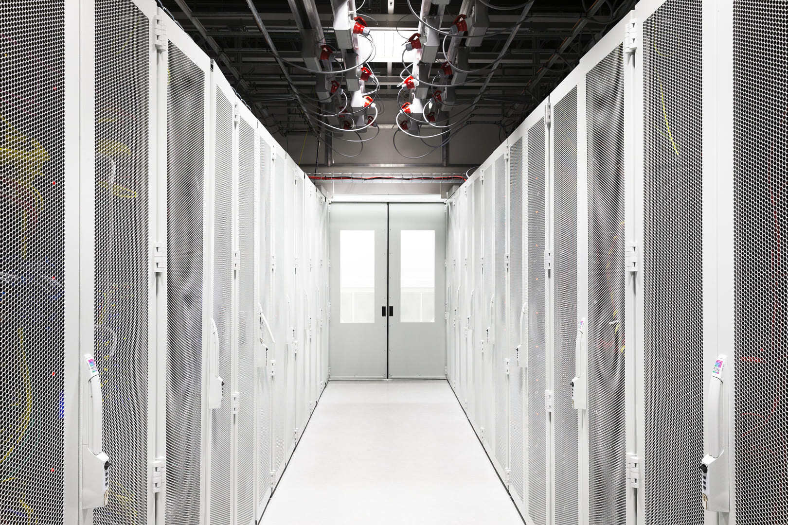 Interior of data hall showing cabinet racks